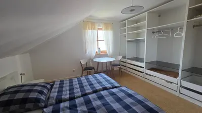 Ein Bett oder Betten in einem Zimmer der Unterkunft Ferienwohnung Dirscherl
