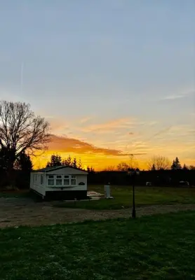 Blick auf den Sonnenuntergang/Sonnenaufgang von des Ferienhauses aus oder aus der Nähe
