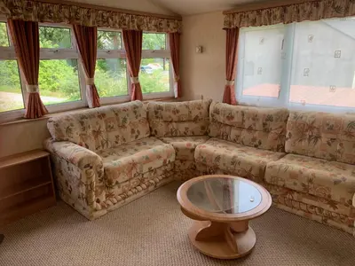 Ein Sitzbereich in der Unterkunft Ferienhaus im Villengarten