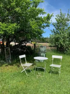 Ein Garten an der Unterkunft Ferienhaus im Villengarten