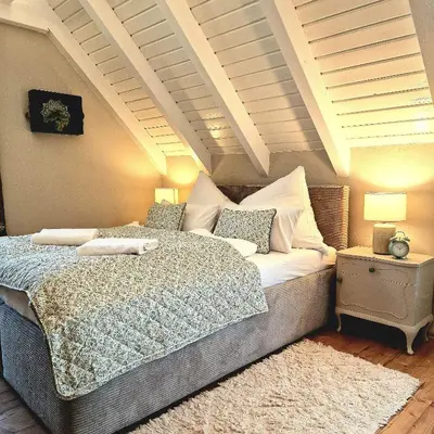Ein Bett oder Betten in einem Zimmer der Unterkunft Select-Home 6 - Ferienhaus, Altstadt & Stadtpark