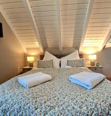 Ein Bett oder Betten in einem Zimmer der Unterkunft Select-Home 6 - Ferienhaus, Altstadt & Stadtpark