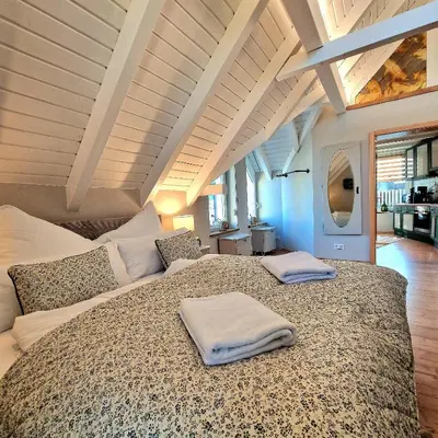 Ein Bett oder Betten in einem Zimmer der Unterkunft Select-Home 6 - Ferienhaus, Altstadt & Stadtpark
