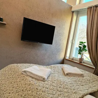 Ein Bett oder Betten in einem Zimmer der Unterkunft Select-Home 6 - Ferienhaus, Altstadt & Stadtpark