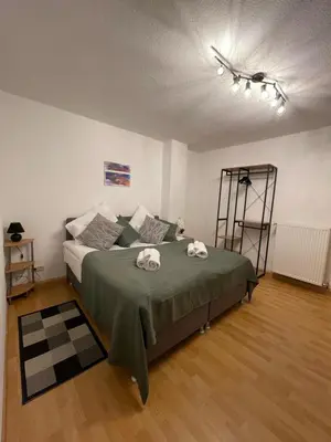 Ein Bett oder Betten in einem Zimmer der Unterkunft City 2-Zimmer Apartment mit Balkon