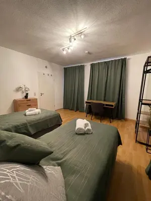 Ein Bett oder Betten in einem Zimmer der Unterkunft City 2-Zimmer Apartment mit Balkon