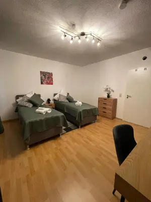 Ein Bett oder Betten in einem Zimmer der Unterkunft City 2-Zimmer Apartment mit Balkon