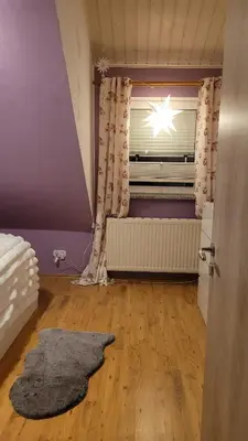 Ein Bett oder Betten in einem Zimmer der Unterkunft Biggy's Apartment