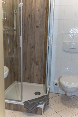 Ein Badezimmer in der Unterkunft Berggasthof Neues Haus