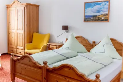 Ein Bett oder Betten in einem Zimmer der Unterkunft Berggasthof Neues Haus