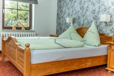 Ein Bett oder Betten in einem Zimmer der Unterkunft Berggasthof Neues Haus