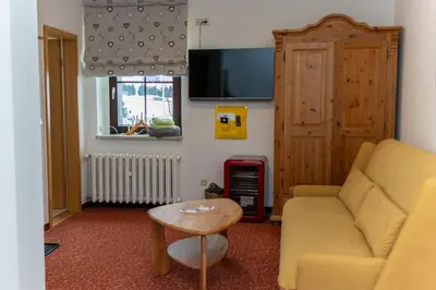 Ein Sitzbereich in der Unterkunft Berggasthof Neues Haus