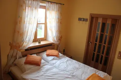 Ein Bett oder Betten in einem Zimmer der Unterkunft Ferienwohnung Edelweiss