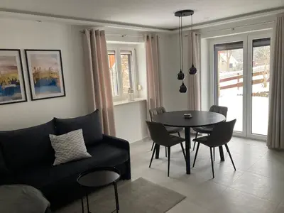 Ein Sitzbereich in der Unterkunft Ferienwohnung Hammerbergblick Rittersgrün
