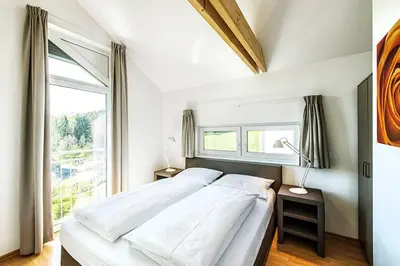 Ein Bett oder Betten in einem Zimmer der Unterkunft Einzelhaus Premium