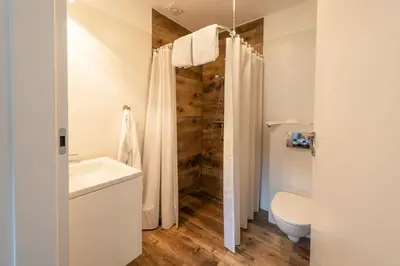 Ein Badezimmer in der Unterkunft Panoramabungalow Typ 70