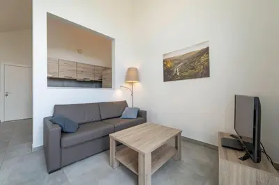 Ein Sitzbereich in der Unterkunft Panoramabungalow DHH
