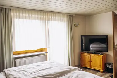 Ein Bett oder Betten in einem Zimmer der Unterkunft Pension Apart