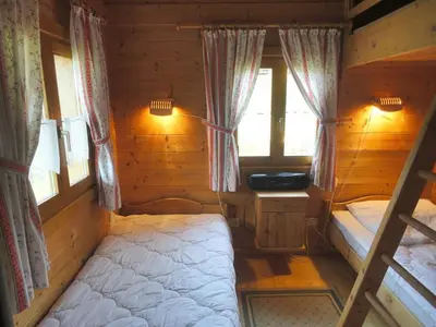 Ein Bett oder Betten in einem Zimmer der Unterkunft Ferienhaus Weil