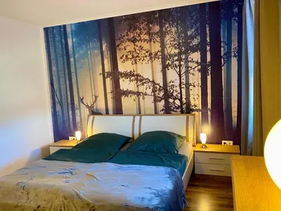Ein Bett oder Betten in einem Zimmer der Unterkunft Fewo Fichtelflair