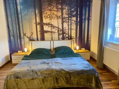Ein Bett oder Betten in einem Zimmer der Unterkunft Fewo Fichtelflair