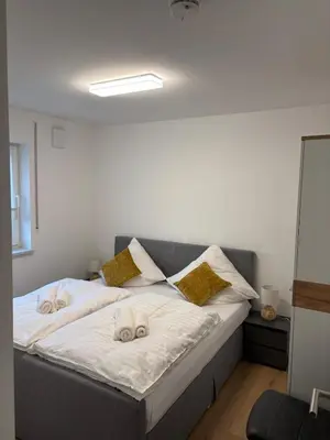 Ein Bett oder Betten in einem Zimmer der Unterkunft Wunderschöne Wohnung in ruhige Stadtviertel