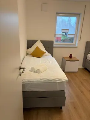 Ein Bett oder Betten in einem Zimmer der Unterkunft Wunderschöne Wohnung in ruhige Stadtviertel