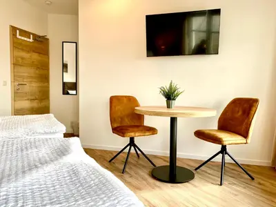 Ein Bett oder Betten in einem Zimmer der Unterkunft Gästehaus Bayreuth