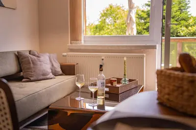 Ein Sitzbereich in der Unterkunft Erzgebirge Suite Gipfelgrün