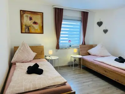 Ein Bett oder Betten in einem Zimmer der Unterkunft Ferienhaus Trockau für 10 Personen