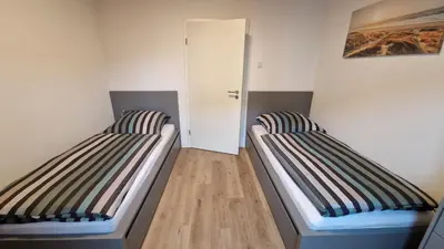 Ein Bett oder Betten in einem Zimmer der Unterkunft Helle gemütliche 3-Zi-Whg mit Terrasse und Gartenzugang
