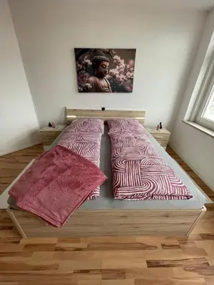 Ein Bett oder Betten in einem Zimmer der Unterkunft 4 Raum Wohnung mit Balkon u Badewanne Phil 3