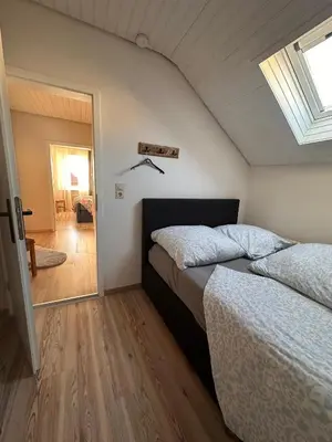 Ein Bett oder Betten in einem Zimmer der Unterkunft Ferienhaus an der Stadtmauer