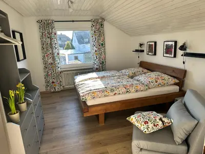 Ein Bett oder Betten in einem Zimmer der Unterkunft Ferienwohnung Kunterbunt
