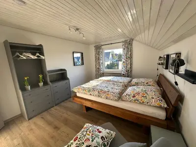 Ein Bett oder Betten in einem Zimmer der Unterkunft Ferienwohnung Kunterbunt