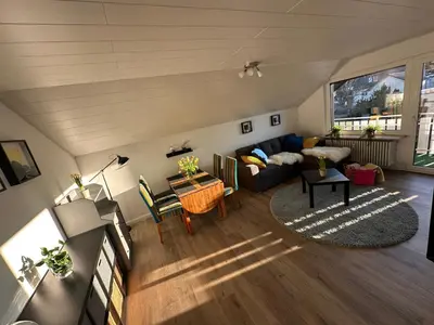 Ein Sitzbereich in der Unterkunft Ferienwohnung Kunterbunt