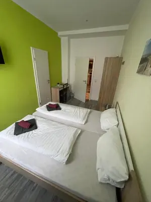 Ein Bett oder Betten in einem Zimmer der Unterkunft Pension Anno 1866