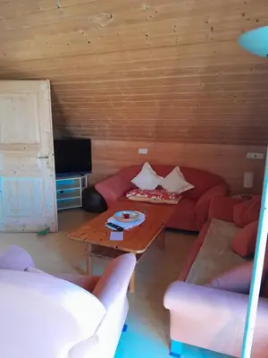 Ein Sitzbereich in der Unterkunft Ferienwohnung Gruber