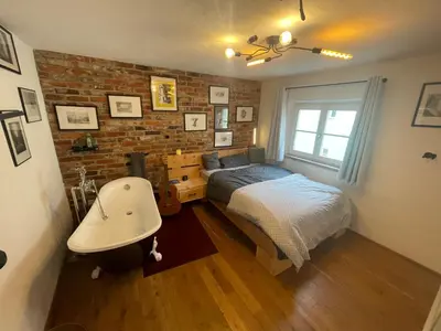 Ein Bett oder Betten in einem Zimmer der Unterkunft Sonido im Stadtzentrum von Sulzbach-Rosenberg