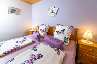 Ein Bett oder Betten in einem Zimmer der Unterkunft Ferienwohnung Spitzner