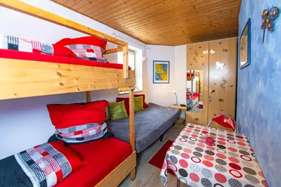 Ein Bett oder Betten in einem Zimmer der Unterkunft Ferienwohnung Spitzner