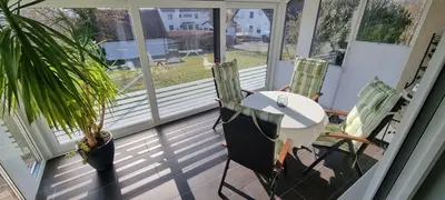 Ein Balkon oder eine Terrasse in der Unterkunft FeWo Süß