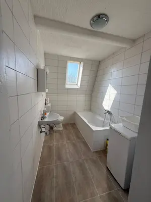 Ein Badezimmer in der Unterkunft Ferienwohnung Goldener Drache