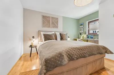 Ein Bett oder Betten in einem Zimmer der Unterkunft Stay Malou Apartment zentrumsnah mit Kaffee-Teebar, Arbeitsplatz, Balkon und kostenlosen Stellplatz