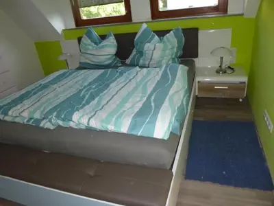 Ein Bett oder Betten in einem Zimmer der Unterkunft Ferienhaus Lisa