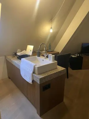Ein Bett oder Betten in einem Zimmer der Unterkunft HotelBurg Falkenberg