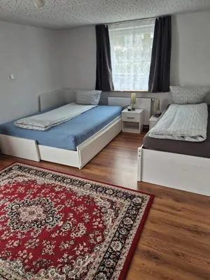 Ein Bett oder Betten in einem Zimmer der Unterkunft Ferienwohnung Selb