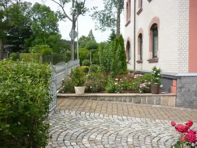 Ein Garten an der Unterkunft Ferienwohnung Panoramablick