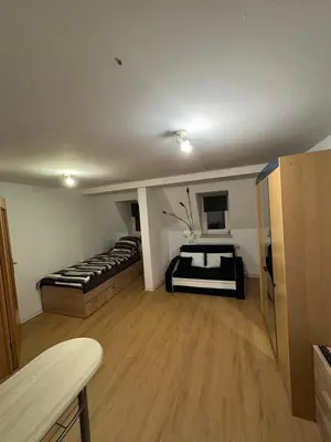 Ein Bett oder Betten in einem Zimmer der Unterkunft 2-Raum Ferienwohnung Zentrumsnah Plauen