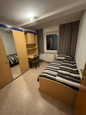 Ein Bett oder Betten in einem Zimmer der Unterkunft 2-Raum Ferienwohnung Zentrumsnah Plauen
